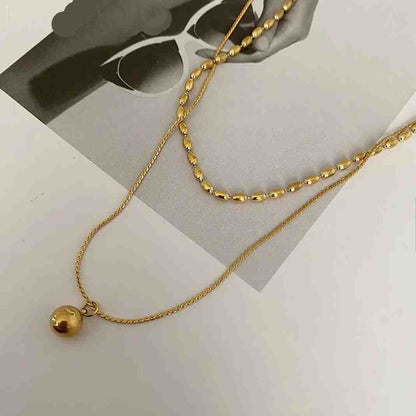 Oblique Bead and Sphere Layered Necklace