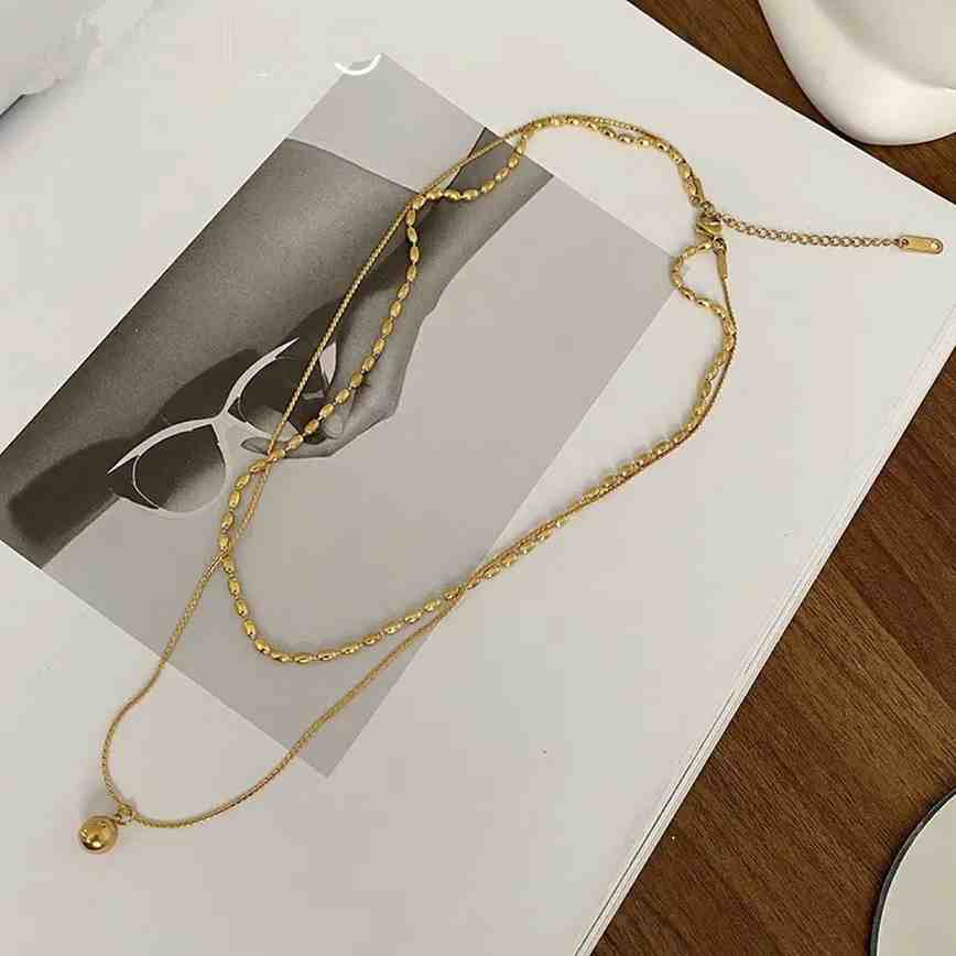 Oblique Bead and Sphere Layered Necklace