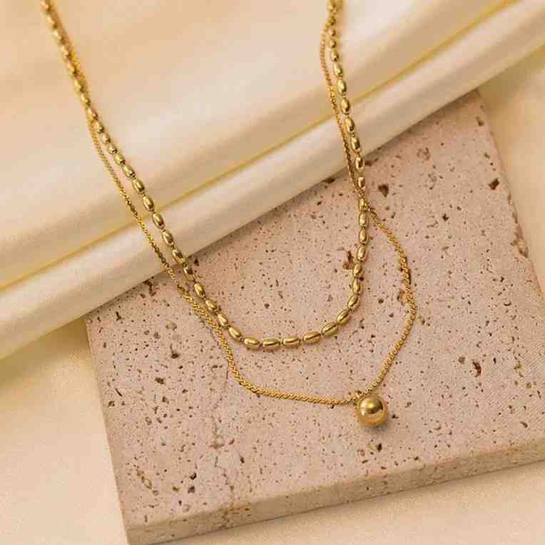 Oblique Bead and Sphere Layered Necklace